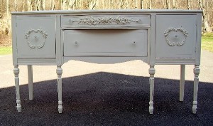 1940's sideboard with gorgeous floral appliques and glass knobs